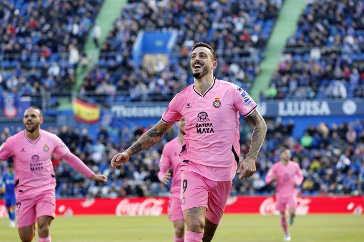 包含赫塔菲客场险胜西班牙人，保持领先优势的词条